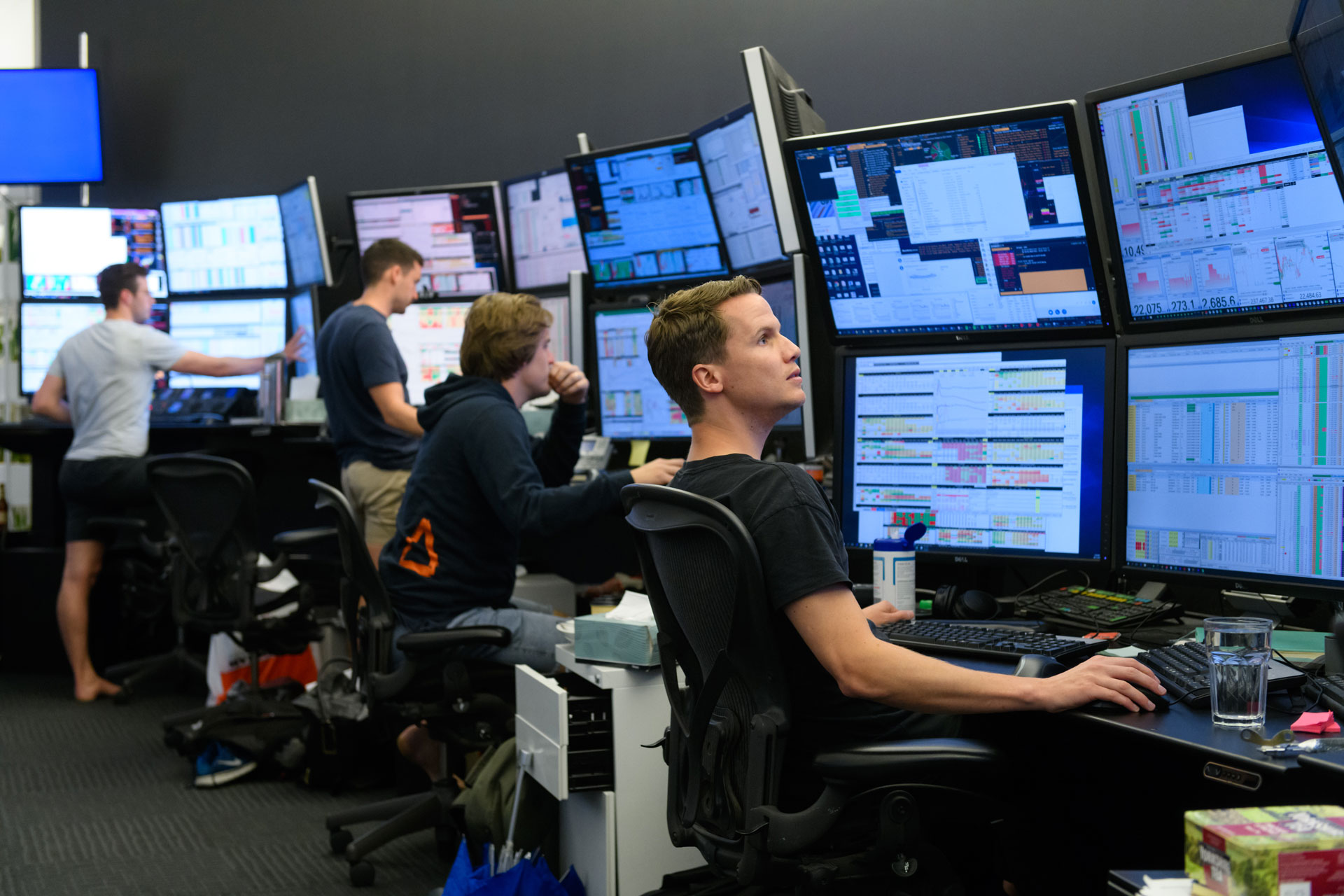 Our trading team working on computers in the Optiver Sydney office